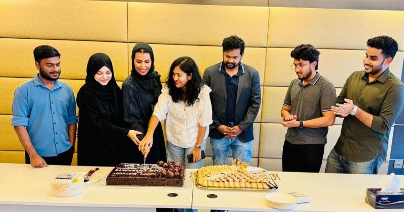 Colleagues gathered to celebrate team birthdays.